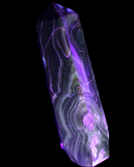 Tall Chocolate Calcite obelisk 154*32mm 439g in UV light - Rocks and Things Store