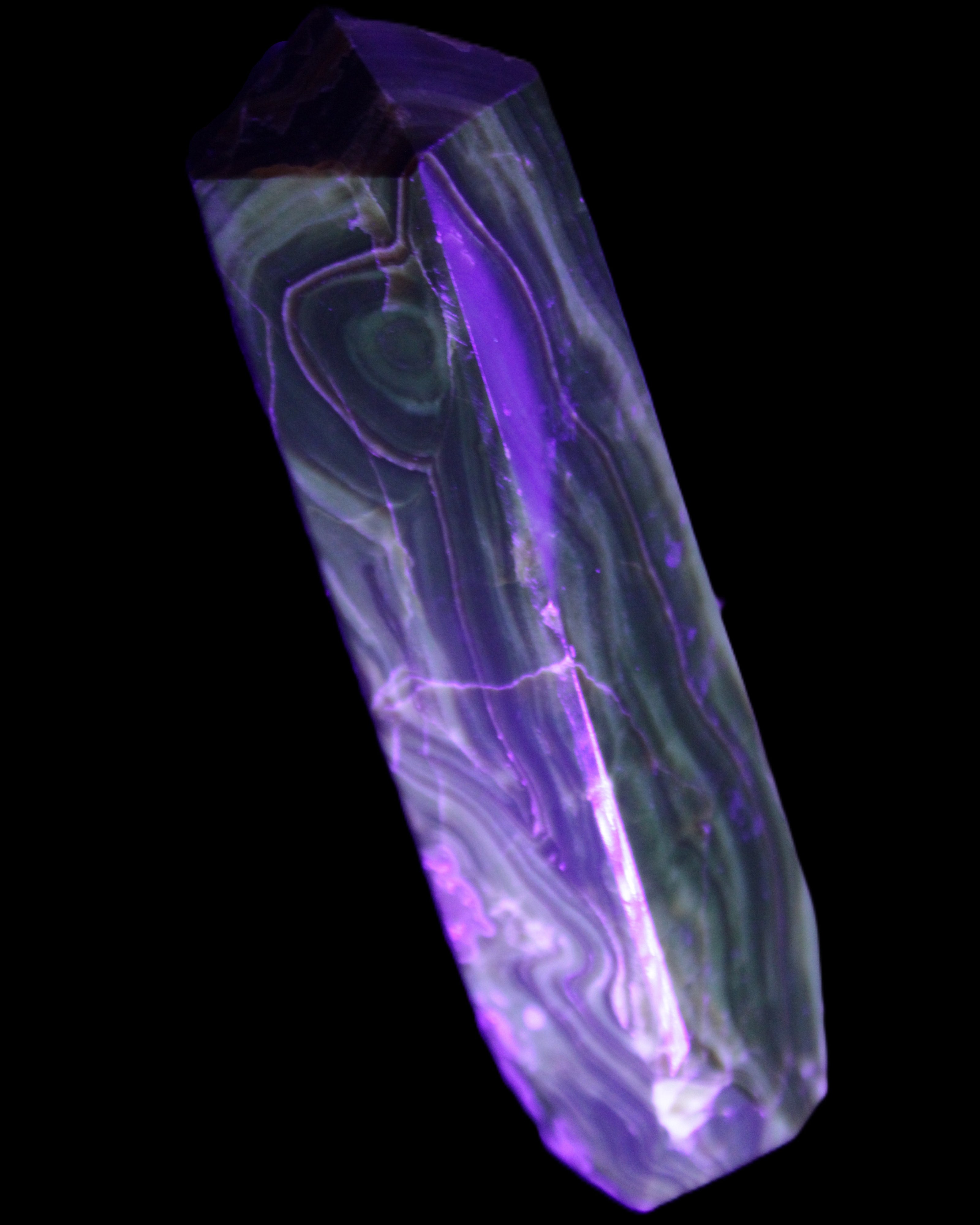 Tall Chocolate Calcite obelisk 154*32mm 439g in UV light - Rocks and Things Store