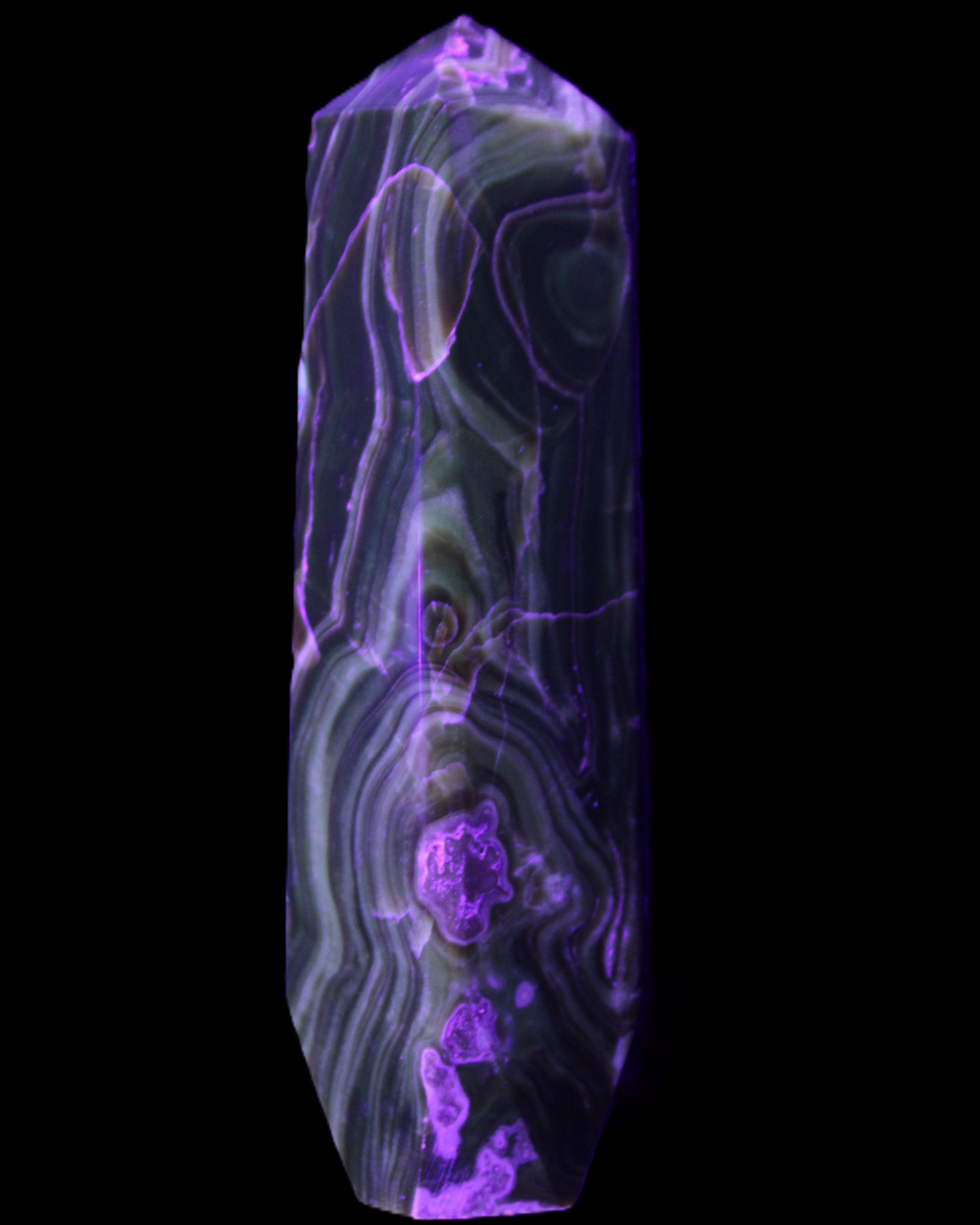 Tall Chocolate Calcite obelisk 154*32mm 439g in UV light - Rocks and Things Store