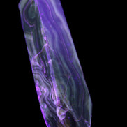 Tall Chocolate Calcite obelisk 154*32mm 439g in UV light - Rocks and Things Store