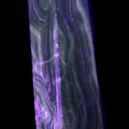 Tall Chocolate Calcite obelisk 154*32mm 439g in UV light - Rocks and Things Store