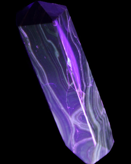Tall Chocolate Calcite obelisk 154*32mm 439g in UV light - Rocks and Things Store