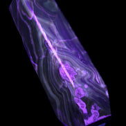 Tall Chocolate Calcite obelisk 154*32mm 439g in UV light - Rocks and Things Store