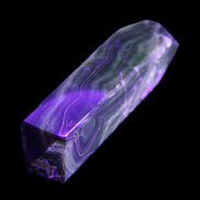 Tall Chocolate Calcite obelisk 154*32mm 439g in UV light - Rocks and Things Store