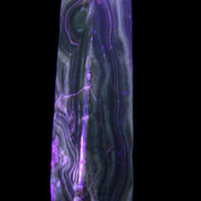 Tall Chocolate Calcite obelisk 154*32mm 439g in UV light - Rocks and Things Store