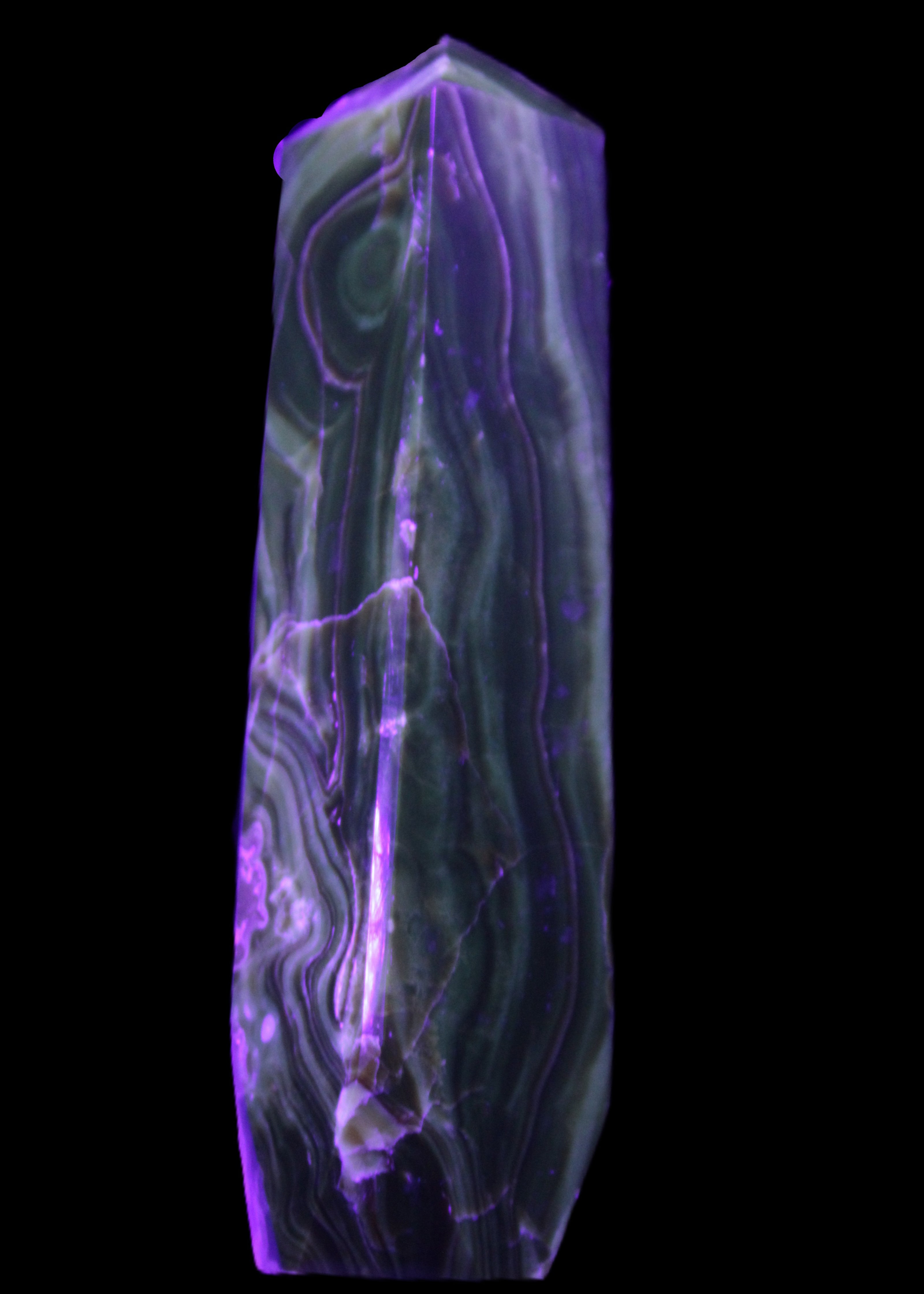 Tall Chocolate Calcite obelisk 154*32mm 439g in UV light - Rocks and Things Store