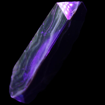Tall Chocolate Calcite obelisk 154*32mm 439g in UV light - Rocks and Things Store