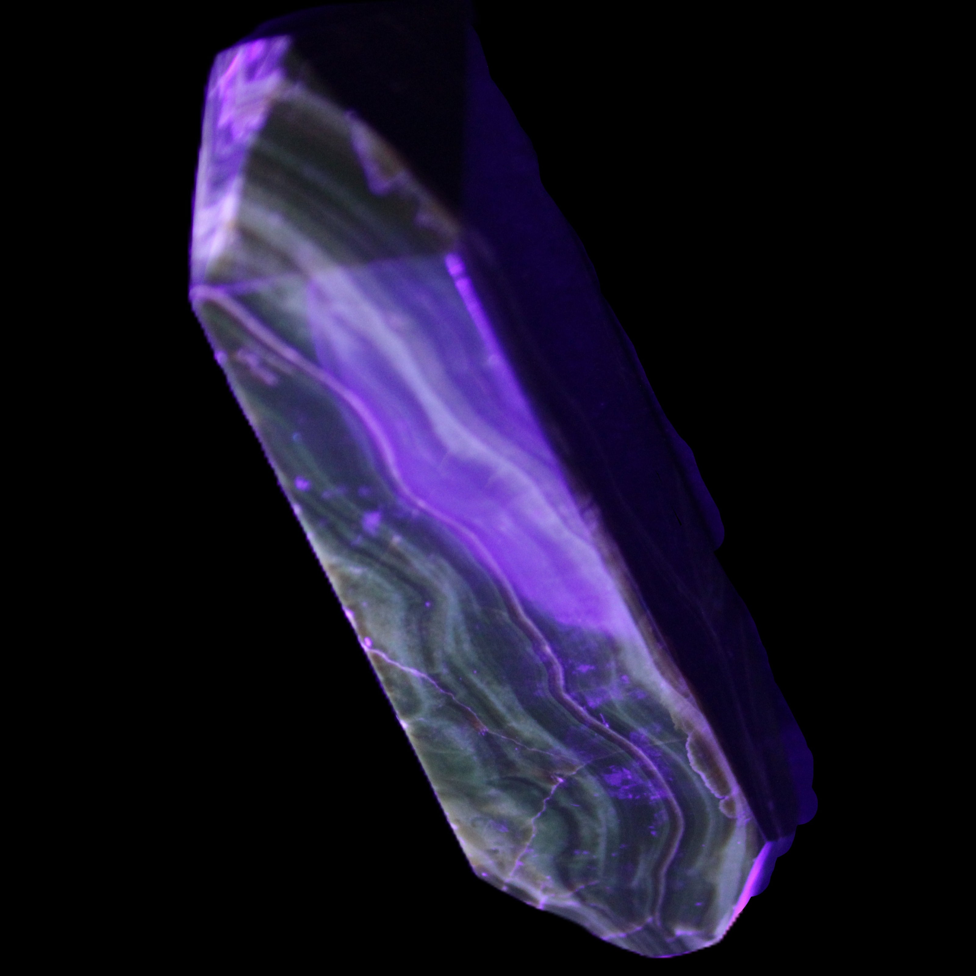 Tall Chocolate Calcite obelisk 154*32mm 439g in UV light - Rocks and Things Store