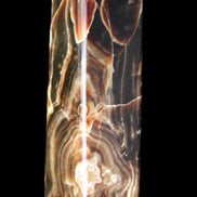 Tall Chocolate Calcite obelisk 154*32mm 439g in UV light - Rocks and Things Store