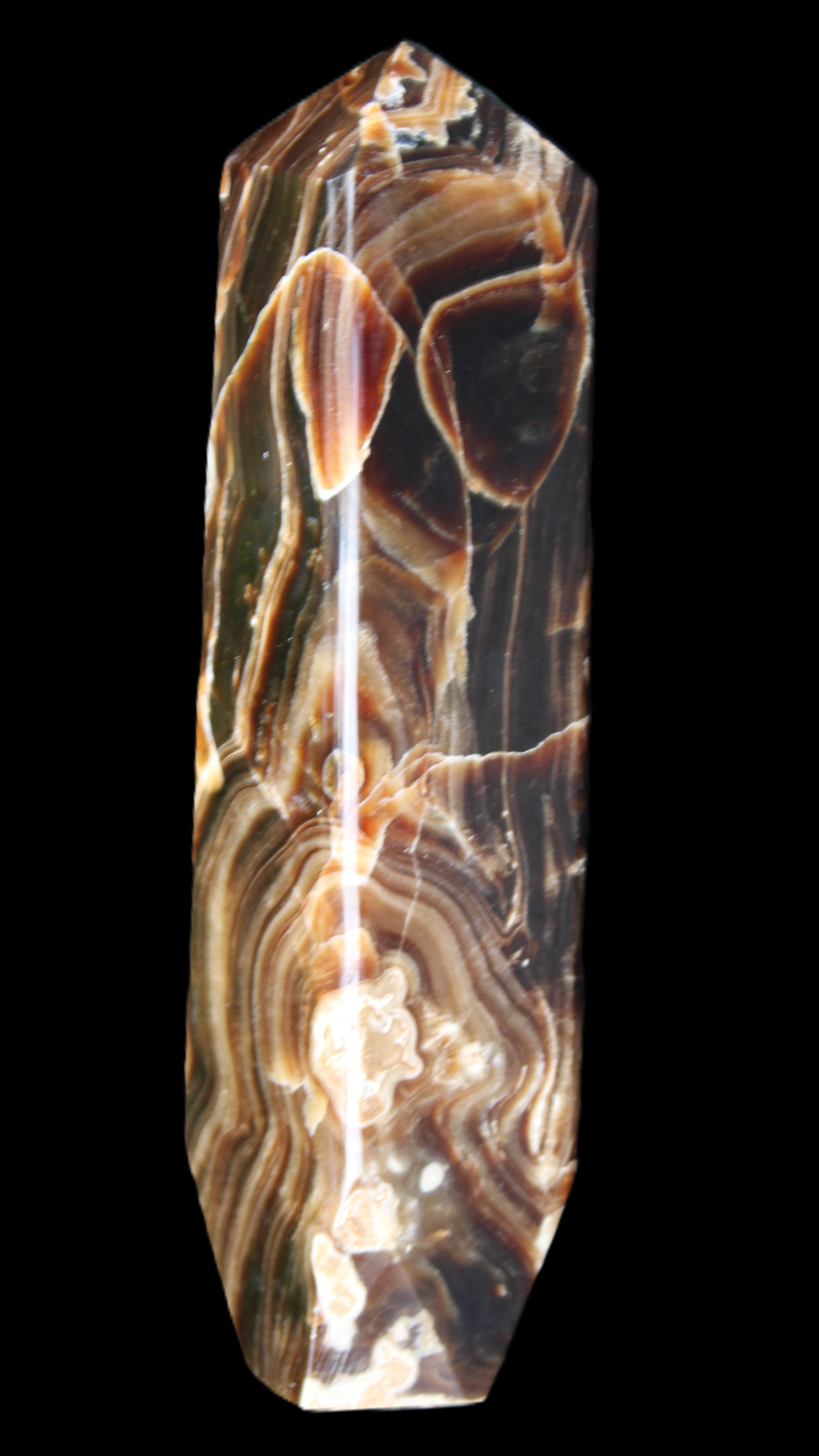 Tall Chocolate Calcite obelisk 154*32mm 439g in UV light - Rocks and Things Store