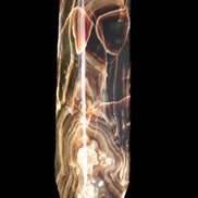 Tall Chocolate Calcite obelisk 154*32mm 439g in UV light - Rocks and Things Store