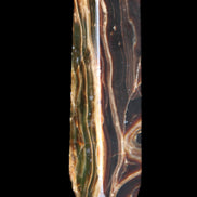 Tall Chocolate Calcite obelisk 154*32mm 439g in UV light - Rocks and Things Store