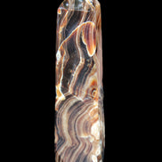 Tall Chocolate Calcite obelisk 154*32mm 439g in UV light - Rocks and Things Store