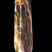 Tall Chocolate Calcite obelisk 154*32mm 439g in UV light - Rocks and Things Store