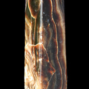 Tall Chocolate Calcite obelisk 154*32mm 439g in UV light - Rocks and Things Store
