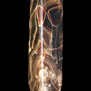 Tall Chocolate Calcite obelisk 154*32mm 439g in UV light - Rocks and Things Store