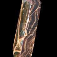 Tall Chocolate Calcite obelisk 154*32mm 439g in UV light - Rocks and Things Store