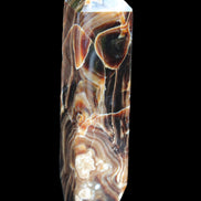 Tall Chocolate Calcite obelisk 154*32mm 439g in UV light - Rocks and Things Store