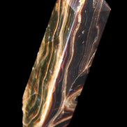 Tall Chocolate Calcite obelisk 154*32mm 439g in UV light - Rocks and Things Store