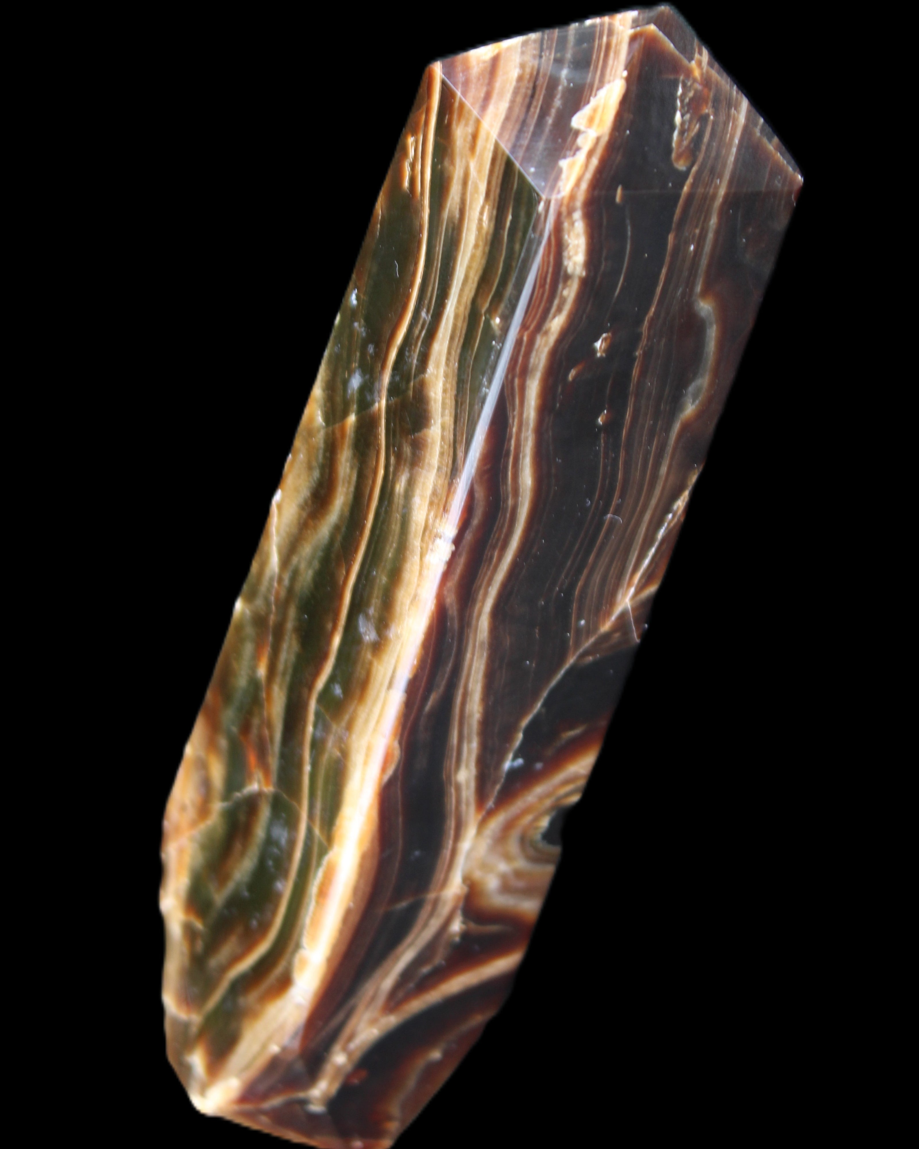 Tall Chocolate Calcite obelisk 154*32mm 439g in UV light - Rocks and Things Store
