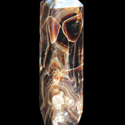 Tall Chocolate Calcite obelisk 154*32mm 439g in UV light - Rocks and Things Store