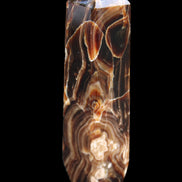 Tall Chocolate Calcite obelisk 154*32mm 439g in UV light - Rocks and Things Store