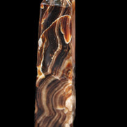 Tall Chocolate Calcite obelisk 154*32mm 439g in UV light - Rocks and Things Store