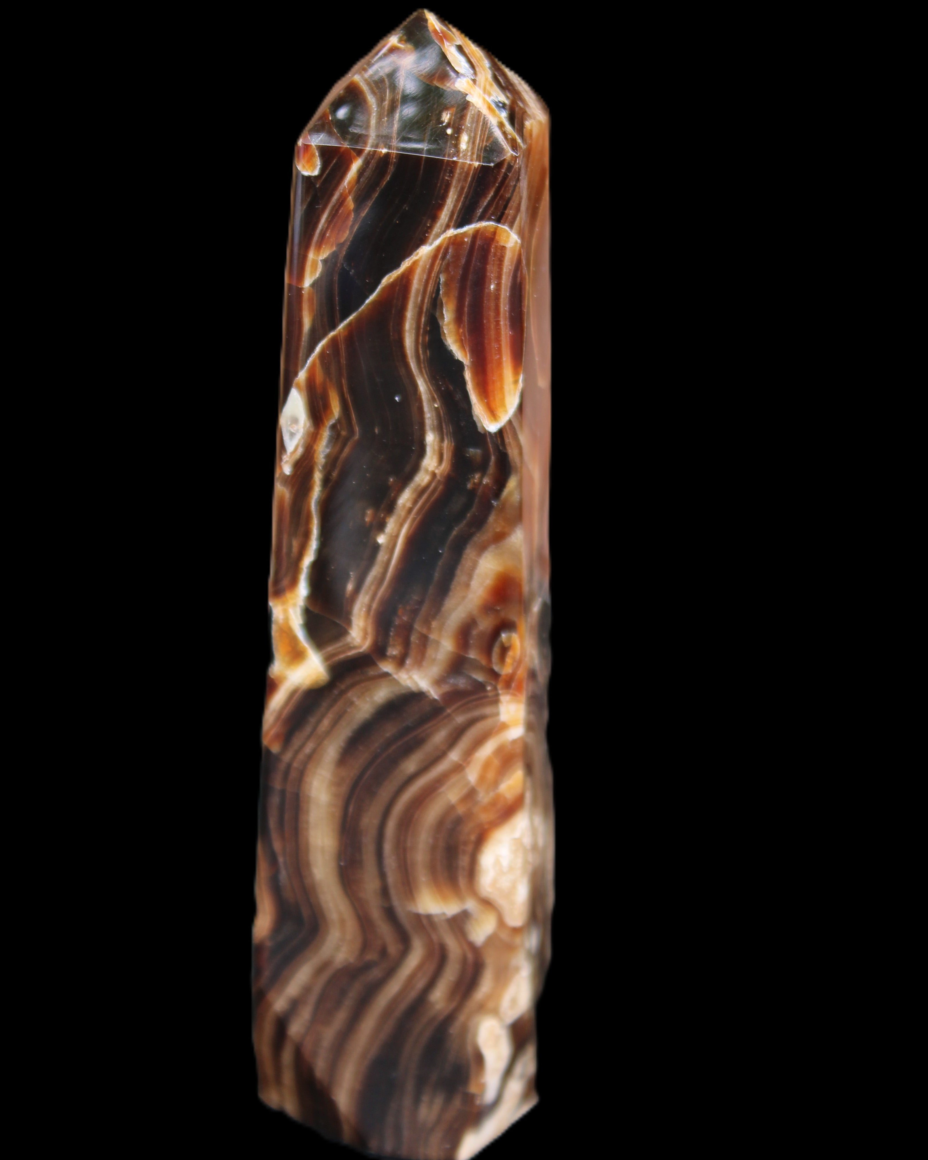 Tall Chocolate Calcite obelisk 154*32mm 439g in UV light - Rocks and Things Store