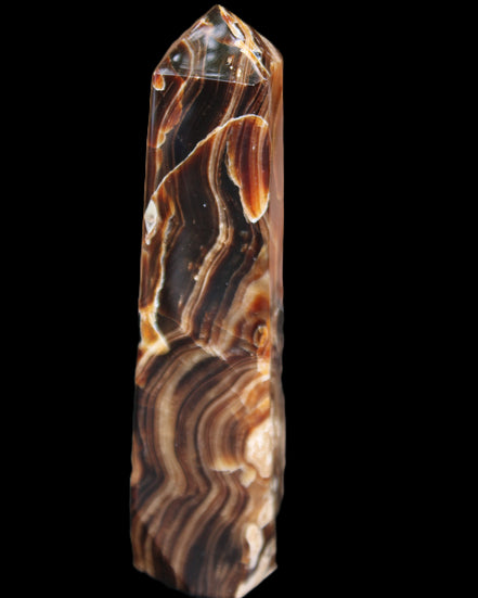 Tall Chocolate Calcite obelisk 154*32mm 439g in UV light - Rocks and Things Store