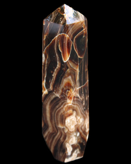 Tall Chocolate Calcite obelisk 154*32mm 439g in UV light - Rocks and Things Store