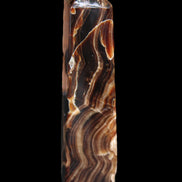 Tall Chocolate Calcite obelisk 154*32mm 439g in UV light - Rocks and Things Store