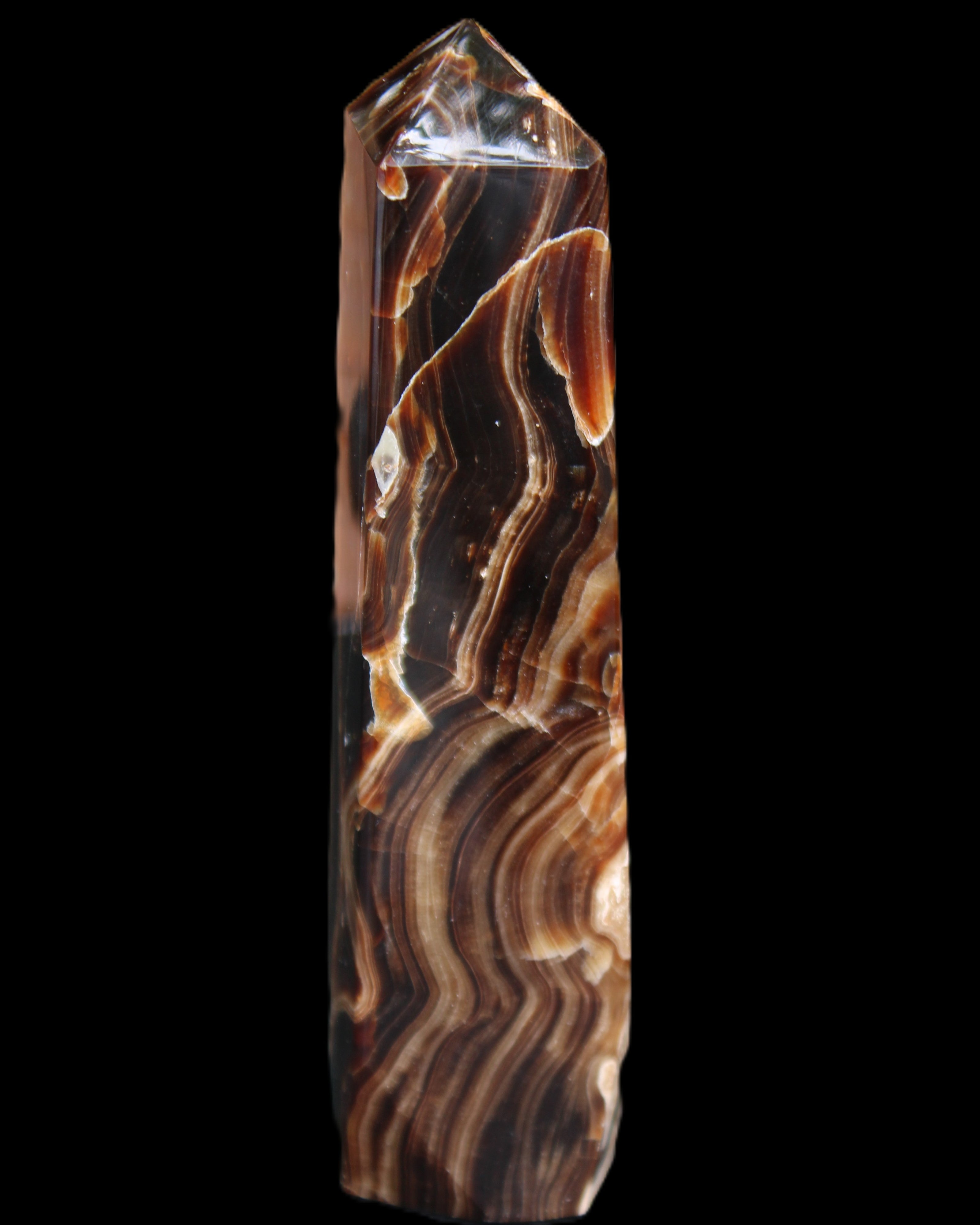Tall Chocolate Calcite obelisk 154*32mm 439g in UV light - Rocks and Things Store