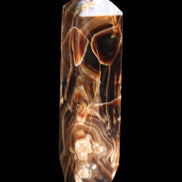 Tall Chocolate Calcite obelisk 154*32mm 439g in UV light - Rocks and Things Store