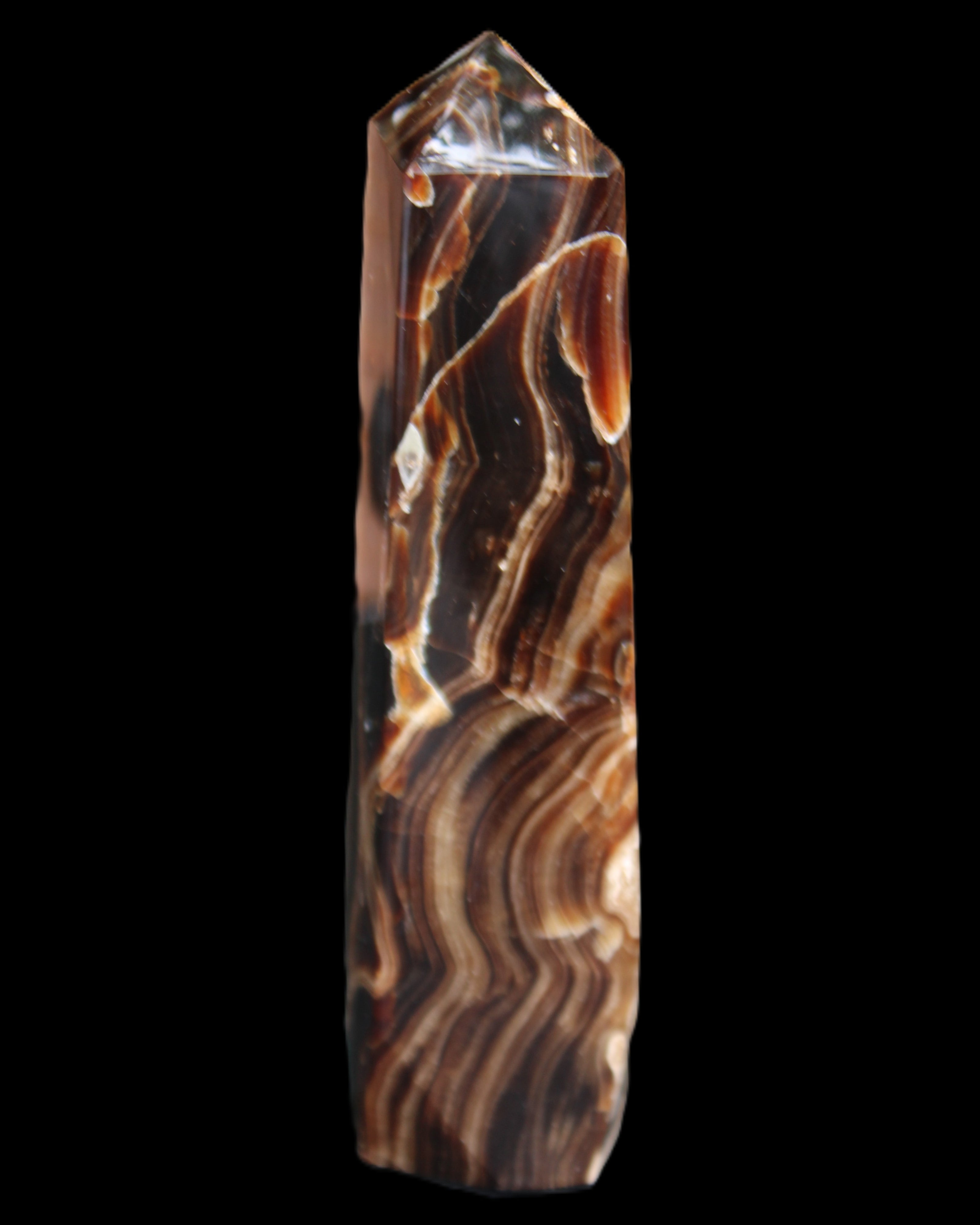 Tall Chocolate Calcite obelisk 154*32mm 439g in UV light - Rocks and Things Store