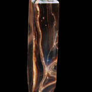 Tall Chocolate Calcite obelisk 154*32mm 439g in UV light - Rocks and Things Store