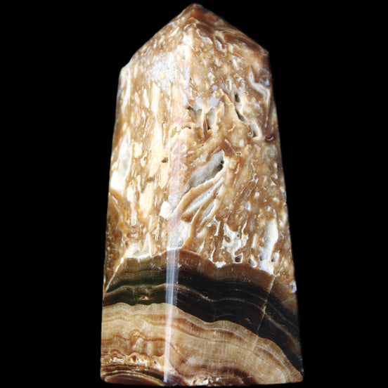 Chocolate Calcite obelisk with caves 95*40mm 217g in UV light - Rocks and Things Store