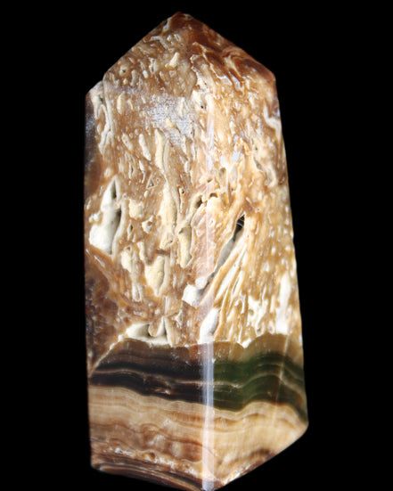 Chocolate Calcite obelisk with caves 95*40mm 217g in UV light - Rocks and Things Store