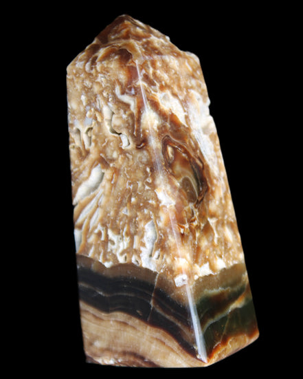 Chocolate Calcite obelisk with caves 95*40mm 217g in UV light - Rocks and Things Store