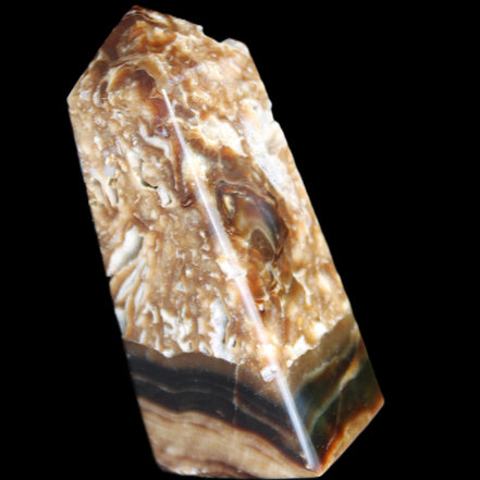 Chocolate Calcite obelisk with caves 95*40mm 217g in UV light - Rocks and Things Store