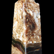 Chocolate Calcite obelisk with caves 95*40mm 217g in UV light - Rocks and Things Store