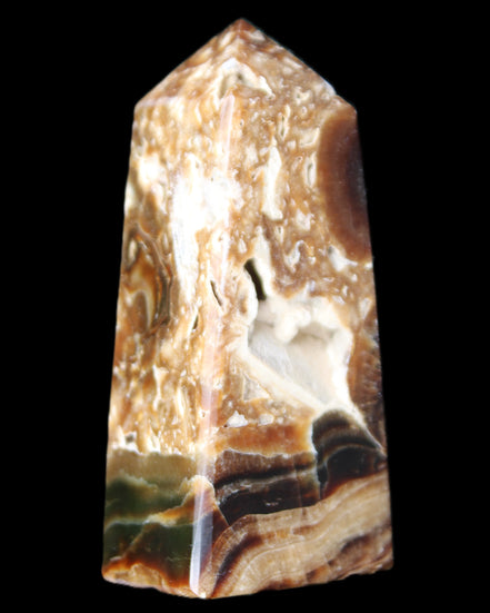 Chocolate Calcite obelisk with caves 95*40mm 217g in UV light - Rocks and Things Store