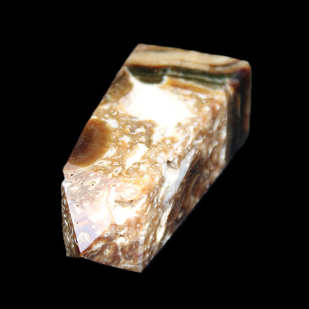 Chocolate Calcite obelisk with caves 95*40mm 217g in UV light - Rocks and Things Store