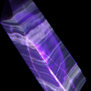 Chocolate Calcite obelisk 119*32mm 270g in UV light  - Rocks and Things Store