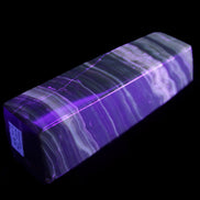 Chocolate Calcite obelisk 119*32mm 270g in UV light  - Rocks and Things Store