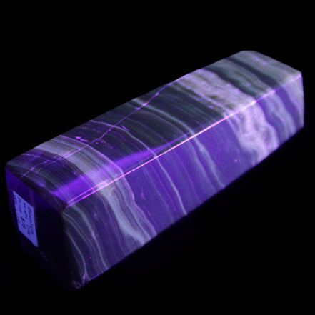 Chocolate Calcite obelisk 119*32mm 270g in UV light  - Rocks and Things Store