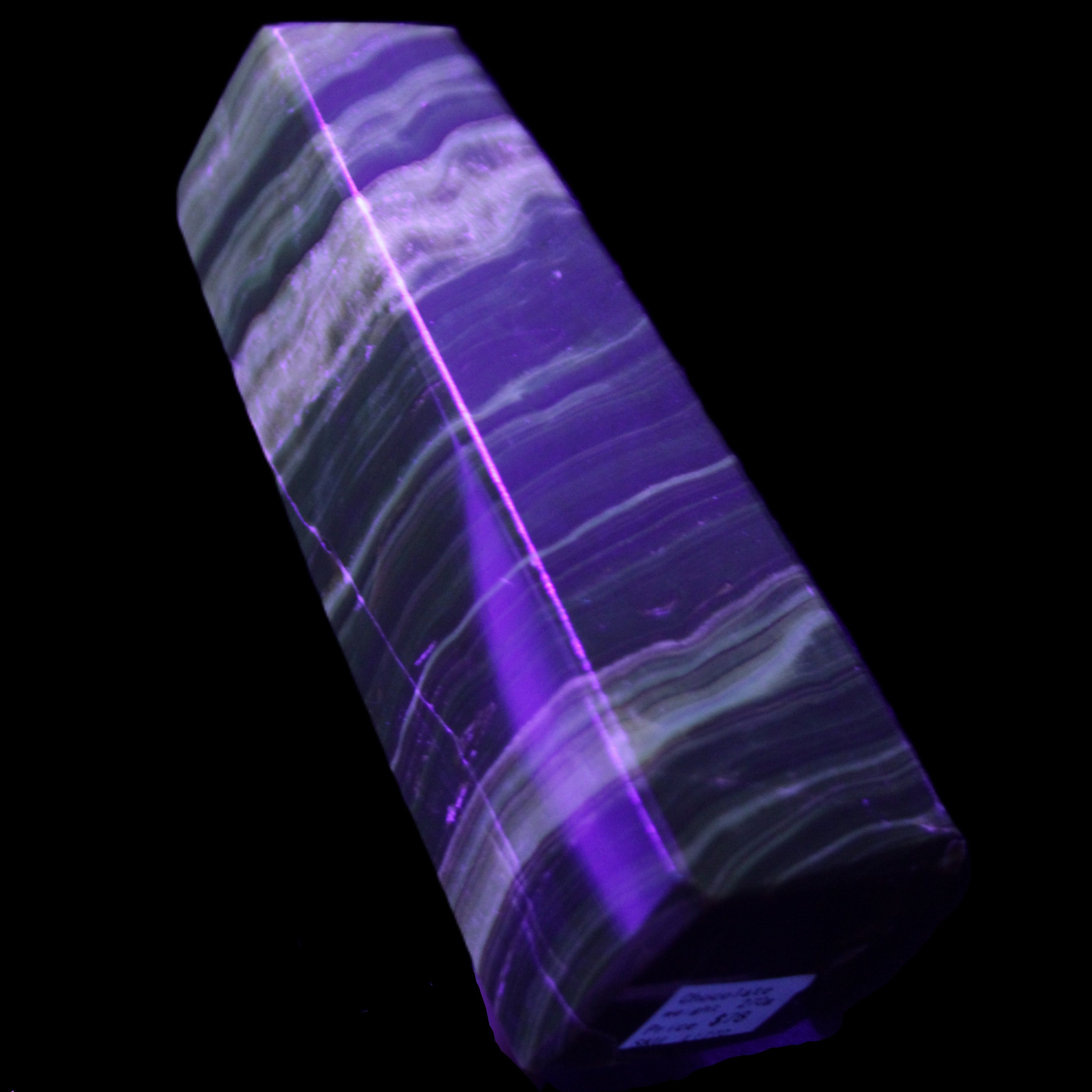 Chocolate Calcite obelisk 119*32mm 270g in UV light  - Rocks and Things Store