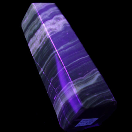 Chocolate Calcite obelisk 119*32mm 270g in UV light  - Rocks and Things Store