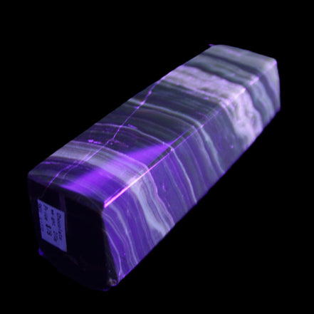 Chocolate Calcite obelisk 119*32mm 270g in UV light  - Rocks and Things Store