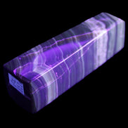 Chocolate Calcite obelisk 119*32mm 270g in UV light  - Rocks and Things Store