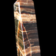 Chocolate Calcite obelisk 119*32mm 270g in UV light  - Rocks and Things Store
